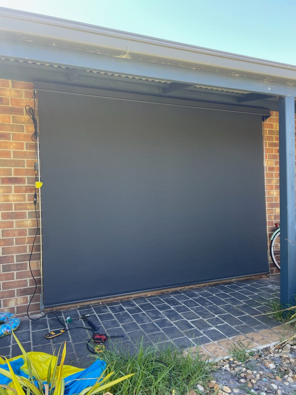 Motorised auto awning over patio