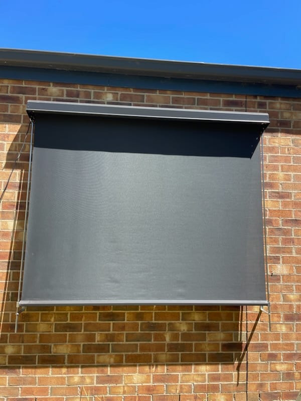 Retractable auto awning installed on home