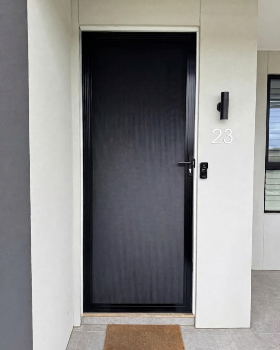 Modern dark grey front door with minimalist design